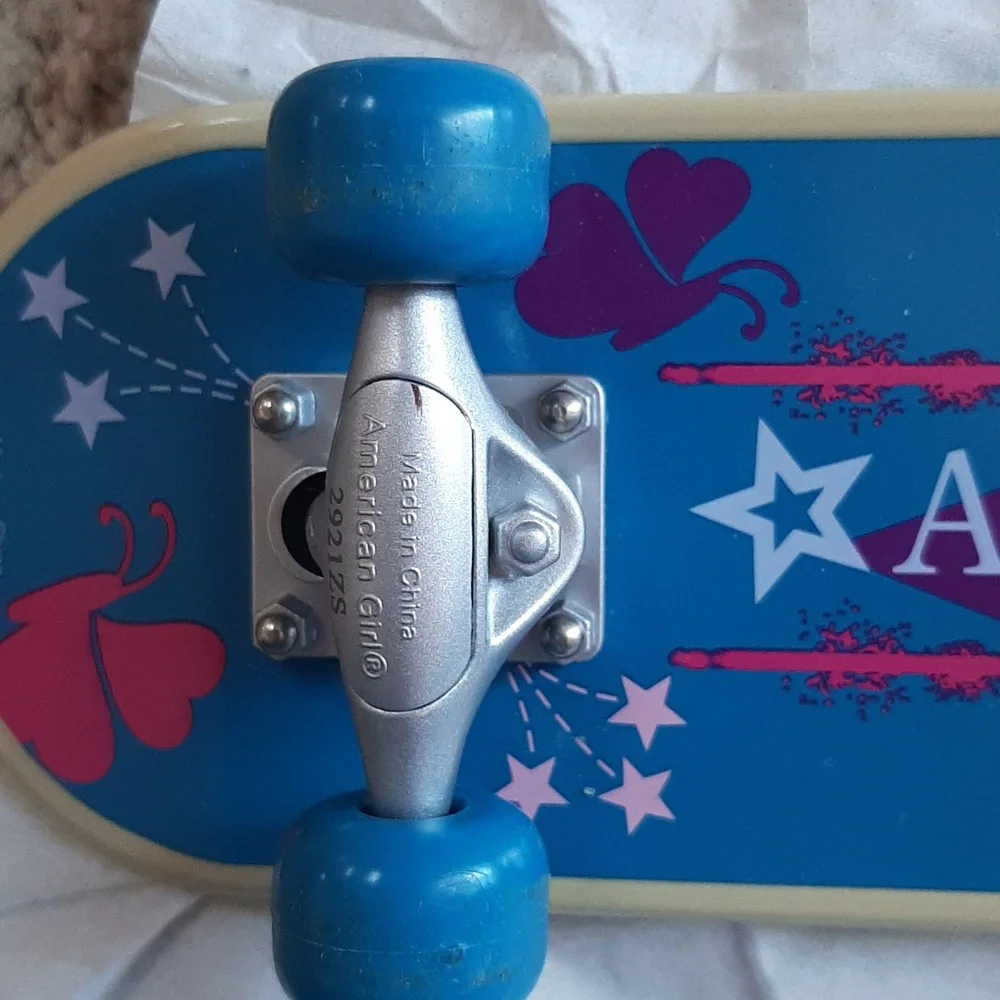American Girl Skateboard with Blue Wheels